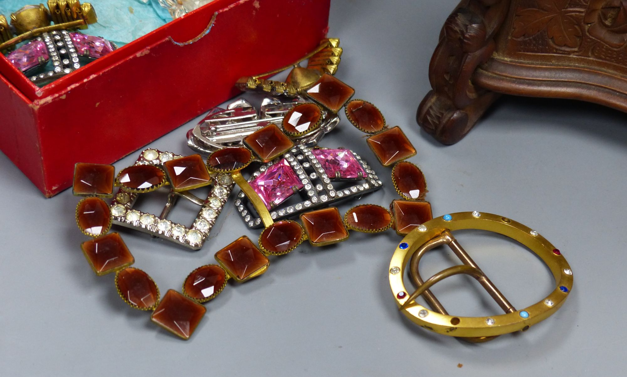 A small collection of paste-set buckles and miscellaneous items,